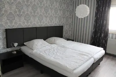 Ein Bett oder Betten in einem Zimmer der Unterkunft Ferienwohnung Oberle