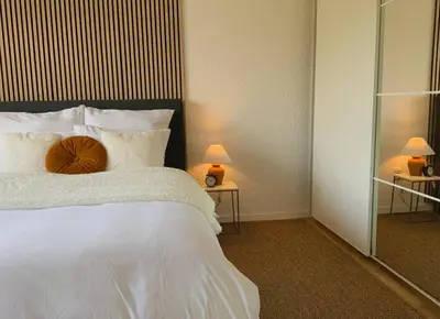 Ein Bett oder Betten in einem Zimmer der Unterkunft Top location • Family-friendly • Parking • Netflix