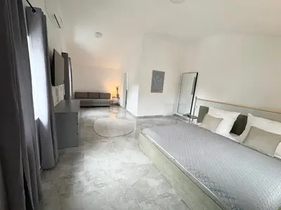 Ein Bett oder Betten in einem Zimmer der Unterkunft HUGOS Design House - ruhig & modern