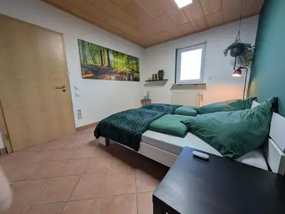 Ein Bett oder Betten in einem Zimmer der Unterkunft Appartement Sonnenschein
