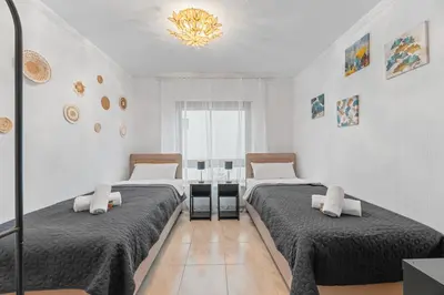Ein Bett oder Betten in einem Zimmer der Unterkunft KRelax Baroque Living - 8 Gäste - Parkplatz & Balkon - SmartTV - Bahnhofsnähe & schnelle Autobahnanbindung