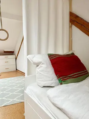 Ein Bett oder Betten in einem Zimmer der Unterkunft Familienidyll nahe Heidelberg