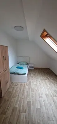 Ein Bett oder Betten in einem Zimmer der Unterkunft Privatpension Dreger