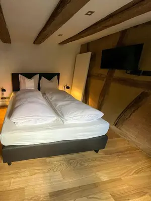 Ein Bett oder Betten in einem Zimmer der Unterkunft 1780 Half-Timbered House At Palatinate Forest