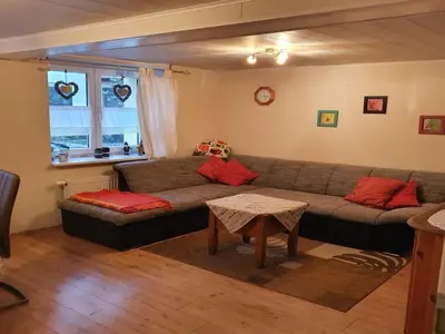 Ein Sitzbereich in der Unterkunft Gästehaus Alte Küferei