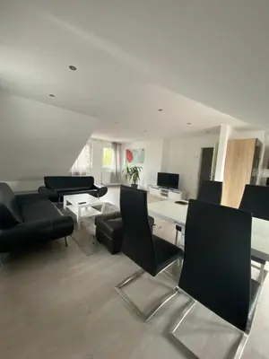Ein Sitzbereich in der Unterkunft Goldstadt