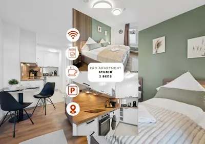 Ein Bett oder Betten in einem Zimmer der Unterkunft F&D Studio Apartment mit Parkplatz