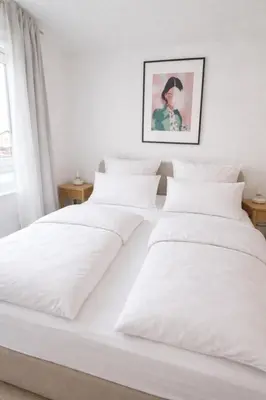 Ein Bett oder Betten in einem Zimmer der Unterkunft Cozy Appartement