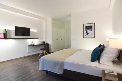 Ein Bett oder Betten in einem Zimmer der Unterkunft Guesthouse Lichtenau