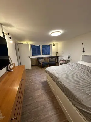 Ein Bett oder Betten in einem Zimmer der Unterkunft Hexenruhe - Stylish, garden studio in Dietzenbach