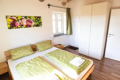 Ein Bett oder Betten in einem Zimmer der Unterkunft 