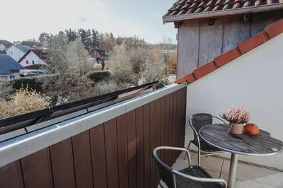 Ein Balkon oder eine Terrasse in der Unterkunft FeWo Kibo Kupferberg