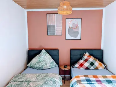 Ein Bett oder Betten in einem Zimmer der Unterkunft Wat Bickenbach