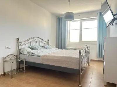Ein Bett oder Betten in einem Zimmer der Unterkunft Ferienwohnung