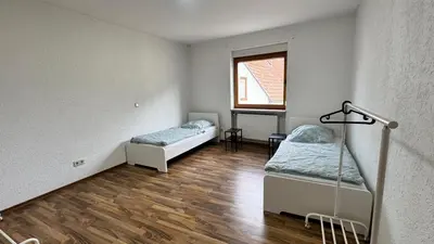 Ein Bett oder Betten in einem Zimmer der Unterkunft Neuhofen Apartments