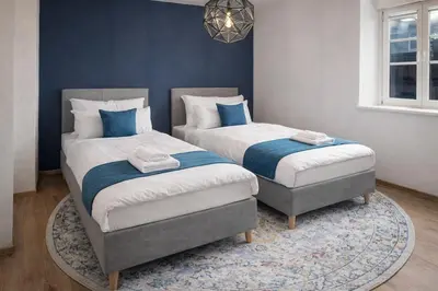 Ein Bett oder Betten in einem Zimmer der Unterkunft Neckarloft - Im Herzen der Altstadt