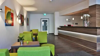 Ein Sitzbereich in der Unterkunft Hotel zum Hirsch