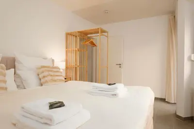 Ein Bett oder Betten in einem Zimmer der Unterkunft Wohnkultur - Designapartment Mannheim