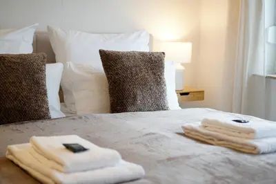 Ein Bett oder Betten in einem Zimmer der Unterkunft Wohnkultur - Designapartment Mannheim