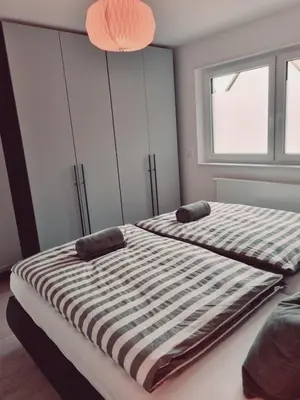 Ein Bett oder Betten in einem Zimmer der Unterkunft Ferienwohnung BellaPfalz