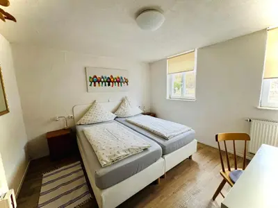 Ein Bett oder Betten in einem Zimmer der Unterkunft Gasthaus Rose