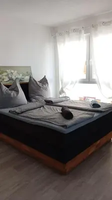 Ein Bett oder Betten in einem Zimmer der Unterkunft Walldürn Zentrum 2