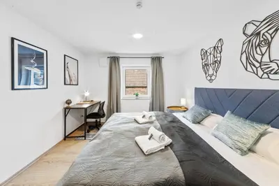 Ein Bett oder Betten in einem Zimmer der Unterkunft Fassring - VINoKAT Living