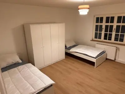 Ein Bett oder Betten in einem Zimmer der Unterkunft 2 Zimmer Appartment für 3 Personen mit Küche und Duschbad