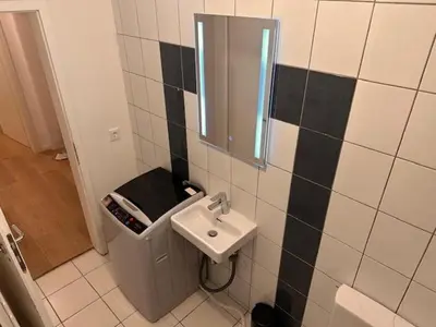 Ein Badezimmer in der Unterkunft 2 Zimmer Appartment für 3 Personen mit Küche und Duschbad