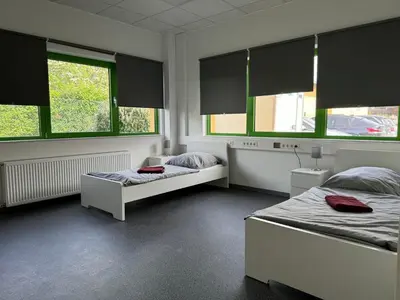 Ein Bett oder Betten in einem Zimmer der Unterkunft Großes Haus in Dieburg