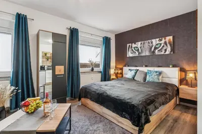Ein Bett oder Betten in einem Zimmer der Unterkunft Business Apartment Lorsch WLAN & Parkplatz