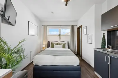 Ein Bett oder Betten in einem Zimmer der Unterkunft Business Apartment Lorsch WLAN & Parkplatz