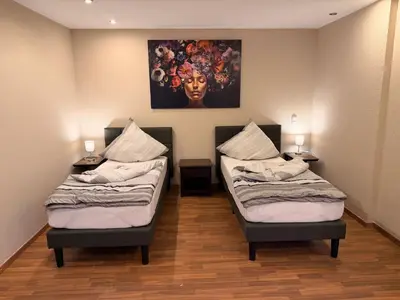 Ein Bett oder Betten in einem Zimmer der Unterkunft Monteur Darius