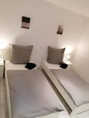 Ein Bett oder Betten in einem Zimmer der Unterkunft bookandstay24 Reinheim bei Darmstadt, Frankfurt, Rhein-Main-Gebiet