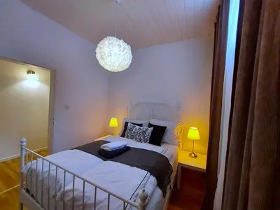 Ein Bett oder Betten in einem Zimmer der Unterkunft Apartmenthaus Schlosspark