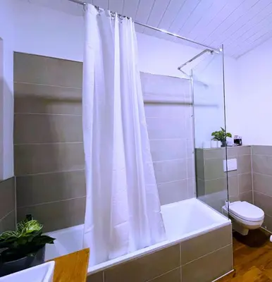 Ein Badezimmer in der Unterkunft Apartmenthaus Schlosspark