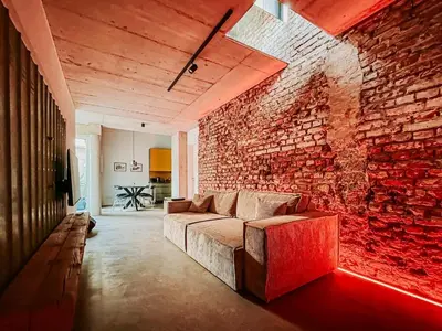 Ein Sitzbereich in der Unterkunft Määkuh I Loft I Wohnen am Flosshafen