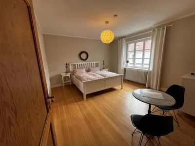Ein Bett oder Betten in einem Zimmer der Unterkunft Ferienapartment für 2 Personen in Alsheim