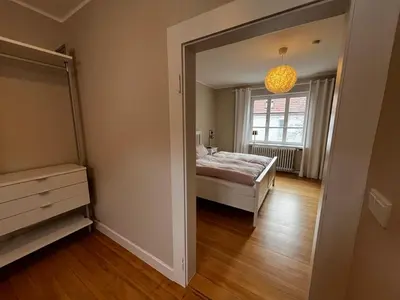 Ein Bett oder Betten in einem Zimmer der Unterkunft Ferienapartment für 2 Personen in Alsheim