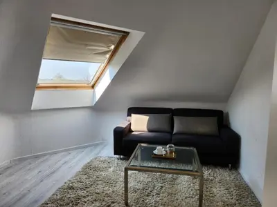 Ein Sitzbereich in der Unterkunft Hotel zur Linde
