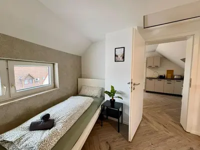Ein Bett oder Betten in einem Zimmer der Unterkunft modernes Apartment 4 für Monteure mit Parkplatz in Lampertheim