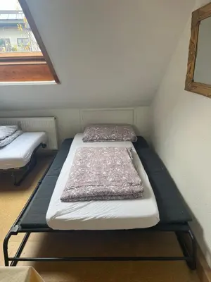 Ein Bett oder Betten in einem Zimmer der Unterkunft 2 Zimmerwohnung