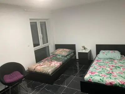 Ein Bett oder Betten in einem Zimmer der Unterkunft SjFewo