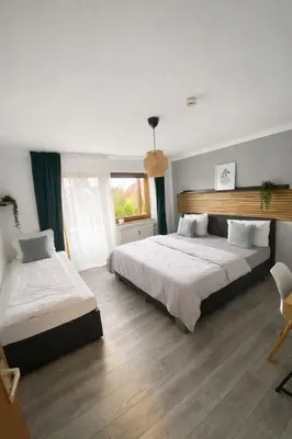 Ein Bett oder Betten in einem Zimmer der Unterkunft Stylische Wohnung am BF Germersheim Business & Monteure