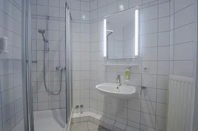 Ein Badezimmer in der Unterkunft Gästehaus & Weingut Volker Schmitt
