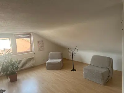 Ein Sitzbereich in der Unterkunft Tinas Ferienwohnung Bietigheim Baden