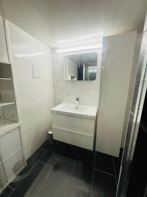 Ein Badezimmer in der Unterkunft Gehobenes Apartment mit Charme