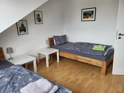 Ein Bett oder Betten in einem Zimmer der Unterkunft Schöne Monteurwohnung in Öhringen