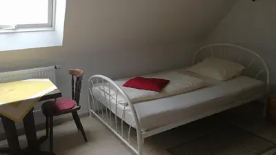 Ein Bett oder Betten in einem Zimmer der Unterkunft Pension Bei Valentina