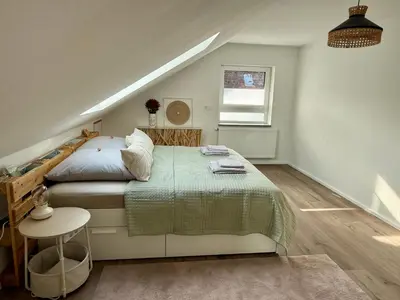 Ein Bett oder Betten in einem Zimmer der Unterkunft Spessart Escape - Ihr stilvoller Rückzugsort im Herzen des Spessarts